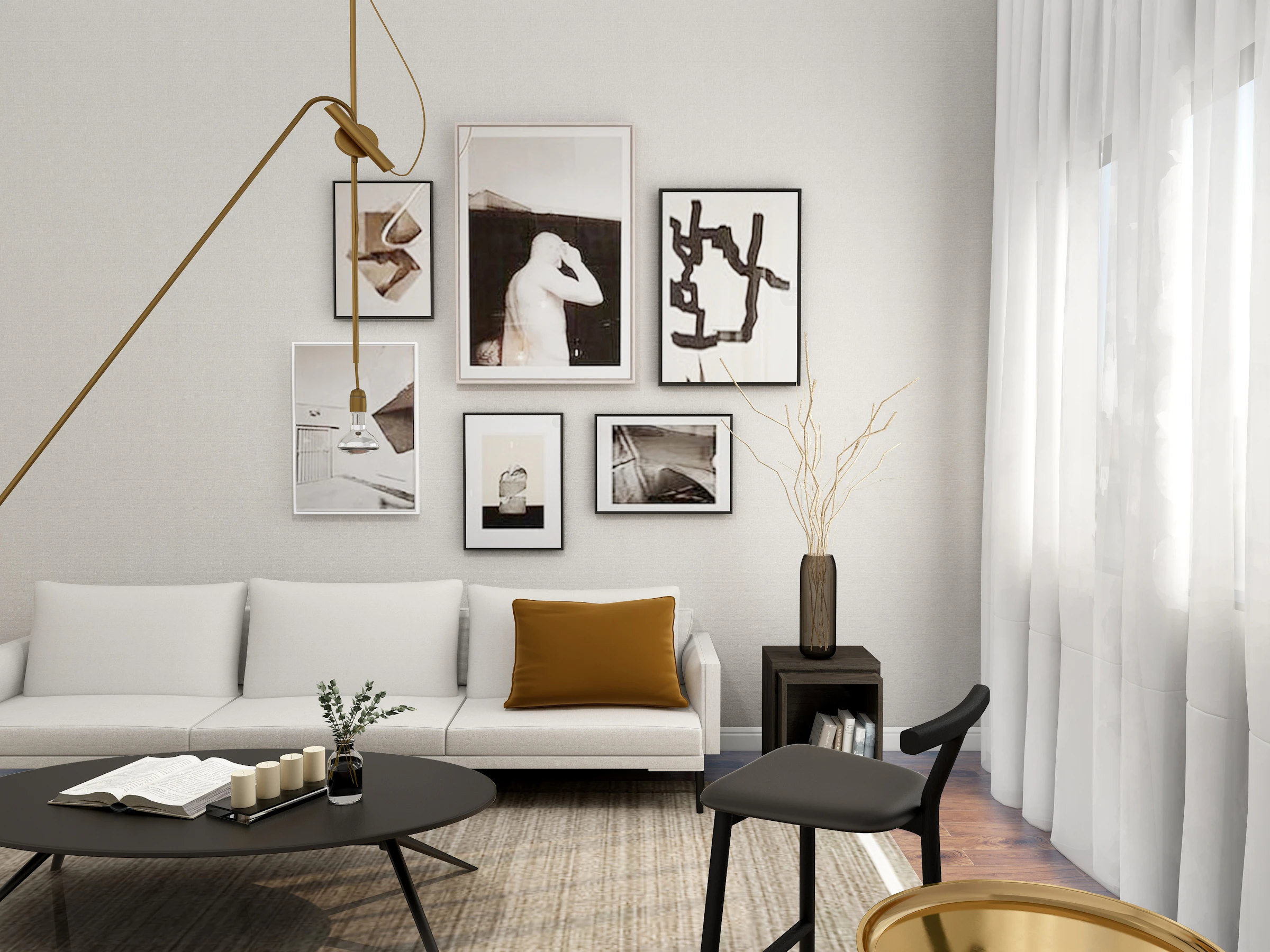 Calm living room with a white sofa, a round coffee table and framed prints